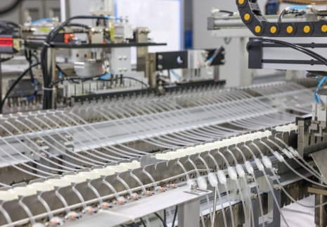 Automatic assembly machine for six parts sets of infusion set